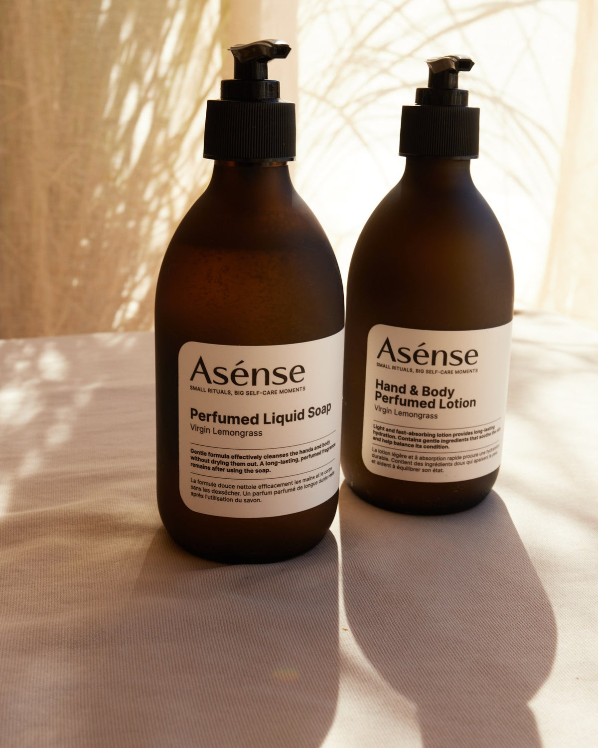 Asense liquid soap and body lotion in the sunlight