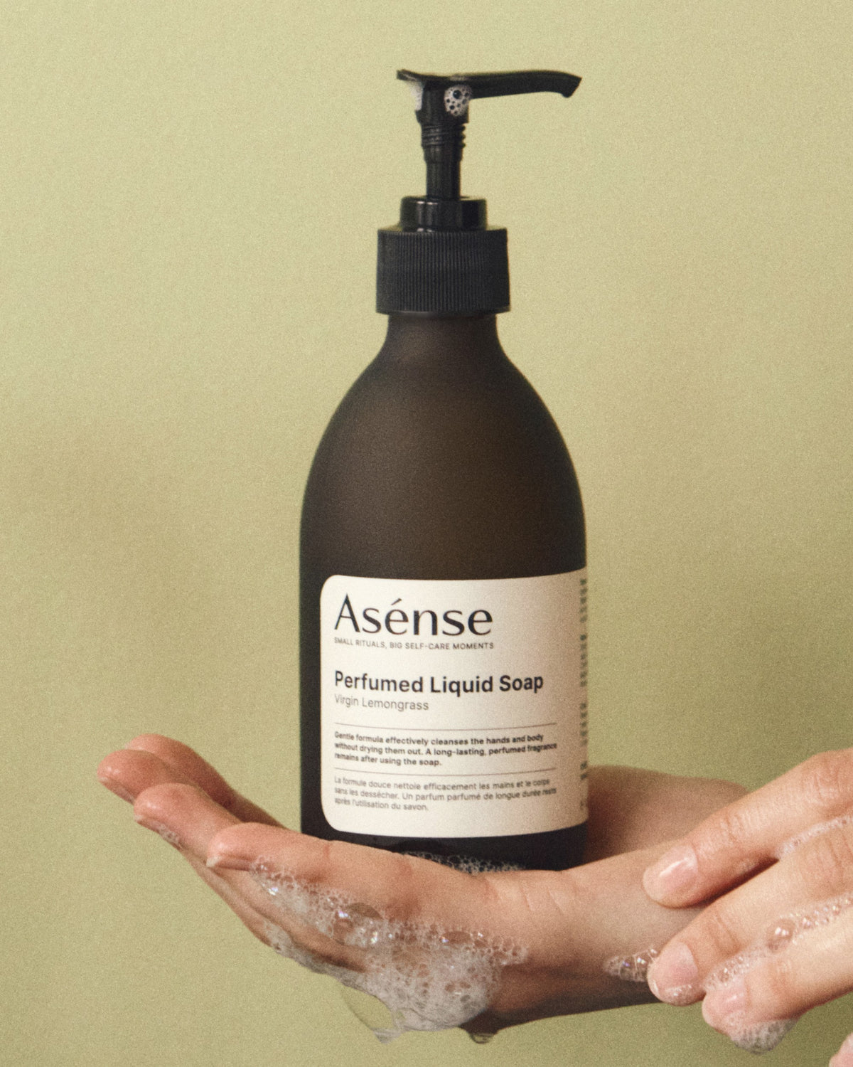 Asense Perfumed Liquid Soap Virgin Lemongrass held in a hand